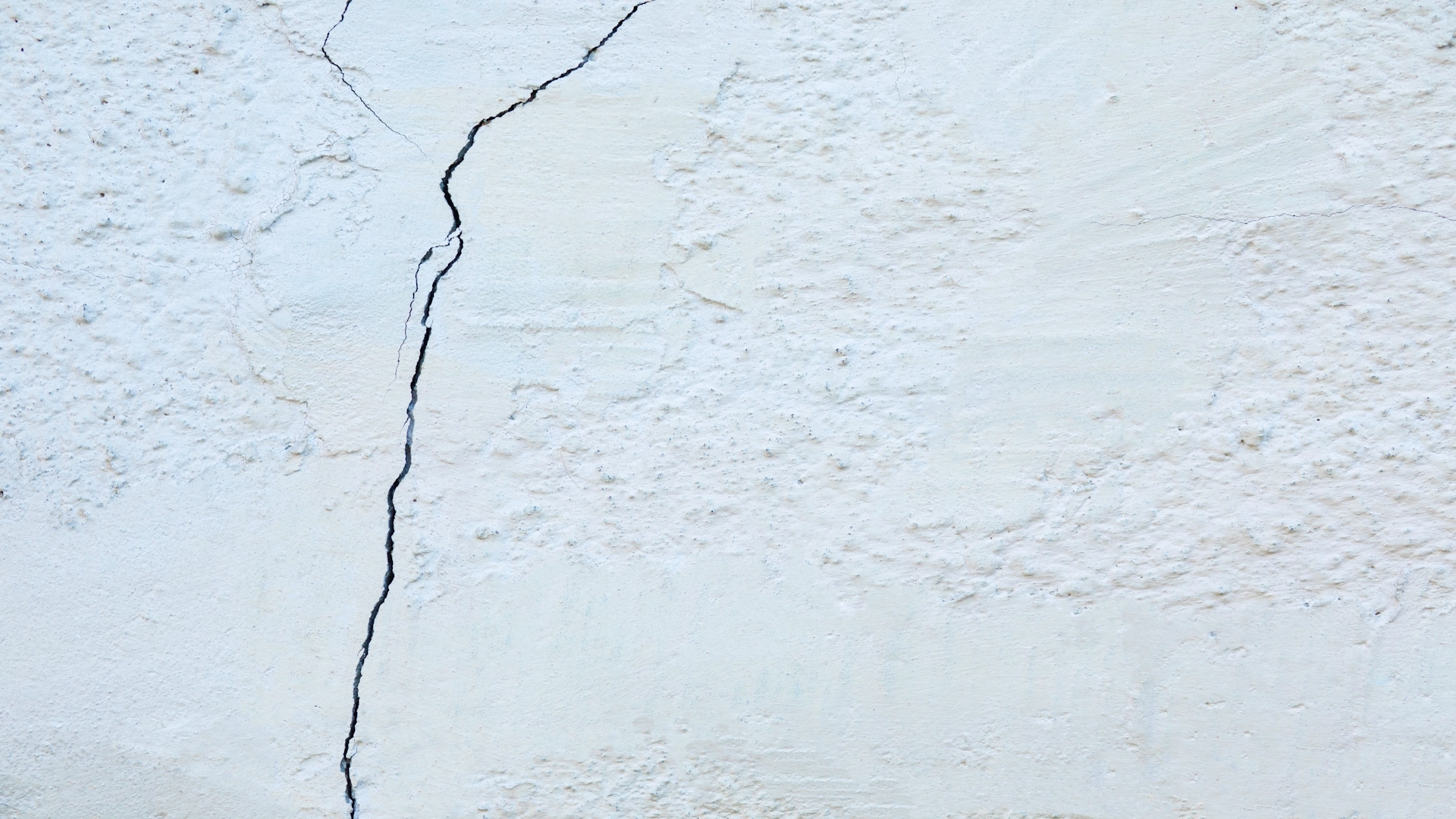 a ceiling with cracks